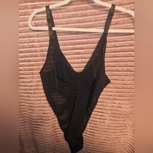 Sheer adjustable compression body suit